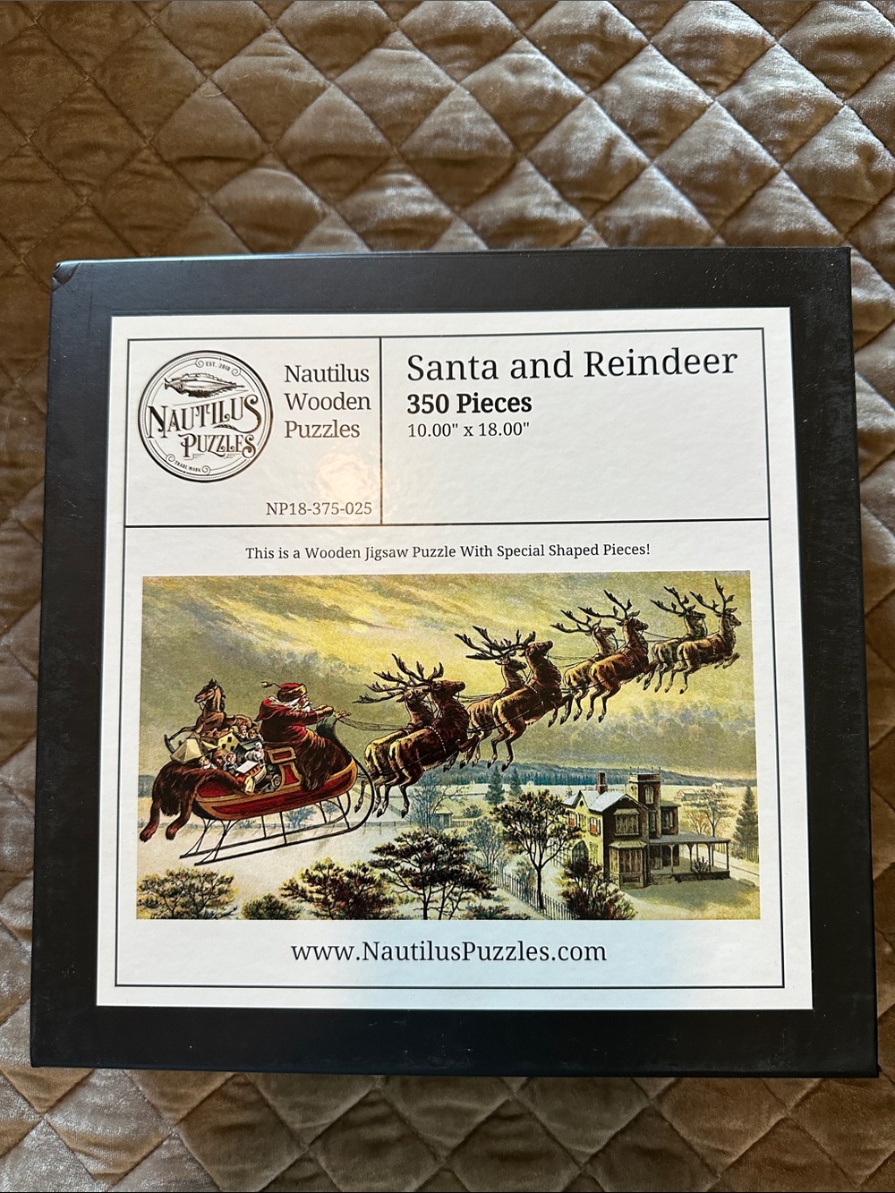 Nautilus Santa and Reindeer Puzzle – Black, White, Red, Green, Gold